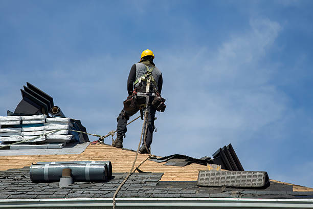 Professional Roofing technician working in Enosburg Falls, VT